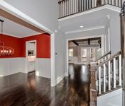 Dining Room open to Two Story Foyer in Chamblee Craftsman Home built by Atlanta Homebuilder Waterford Homes